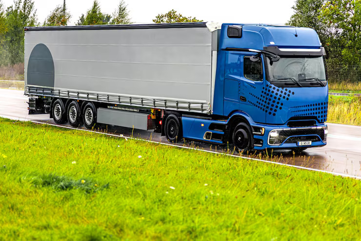 modern-blue-truck-wet-highway-power-reliability-motion_169016-69836 modern-blue-truck-wet-highway